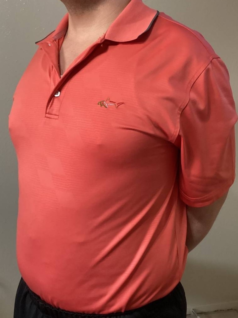 Greg Norman Collection Coral Polo with Shark Logo